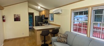 ROOMY PARK MODEL HOME WITH PRIVATE BEDROOM WITH QUEEN SIZE BED, FULL KITCHEN AND BATHROOM, LIVING ROOM WITH PULL-OUT QUEEN-SIZE BED IN COUCH. HAS COVERED PARKING & A DECK, WITH SHED.  MONTHLY RATE IS $1,400, BUT PLEASE CALL FOR AVAILABILITY.