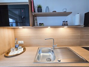 Fridge, microwave, oven, stovetop - Inn-Side Rottweil- Modern vacation apartment with tower view in Rottweil (Rottweil)