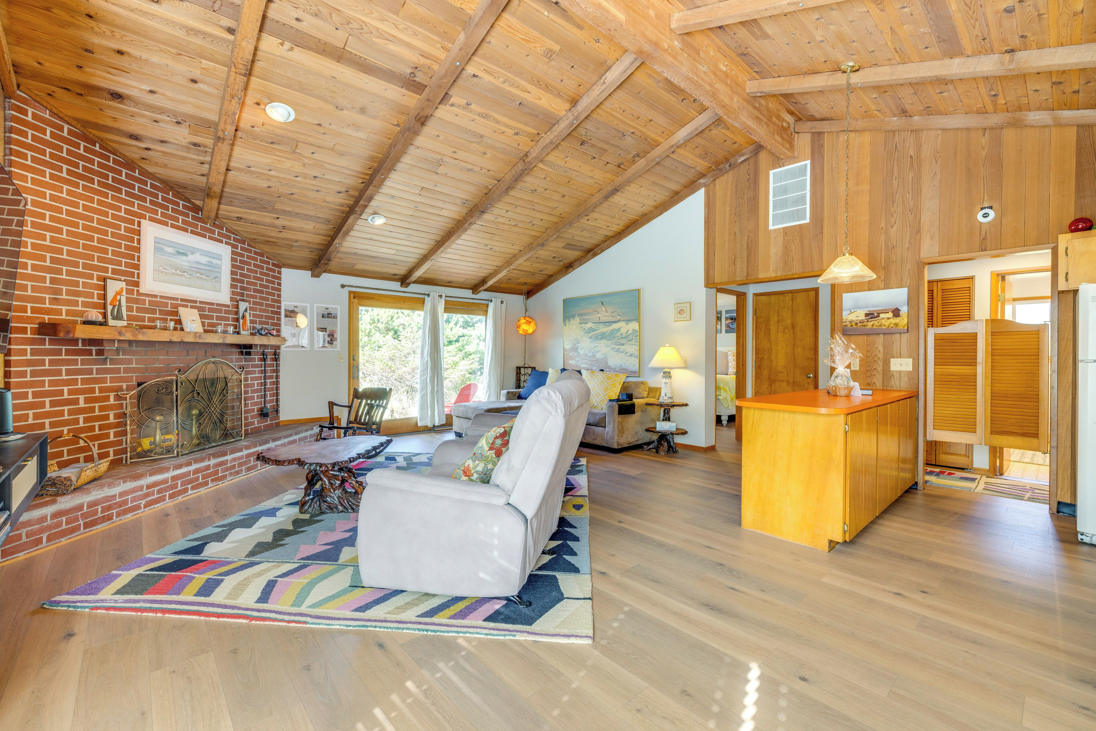 TV, fireplace, books