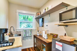 Fridge, microwave, coffee/tea maker, toaster