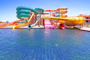A water park with multiple slides and a pool. - Pickalbatros Laguna Club (Sharm El Sheikh)