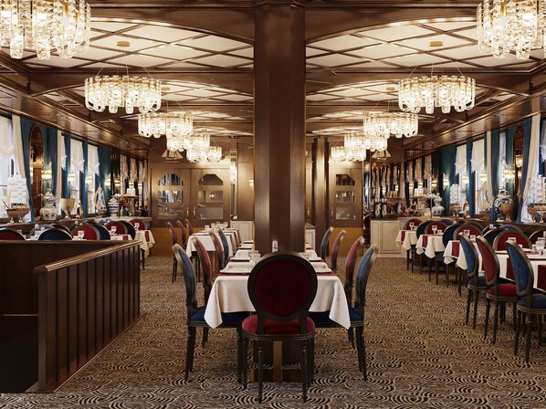 A formal dining room with multiple tables, chairs, and chandeliers. - Botel Albatros (Prague)