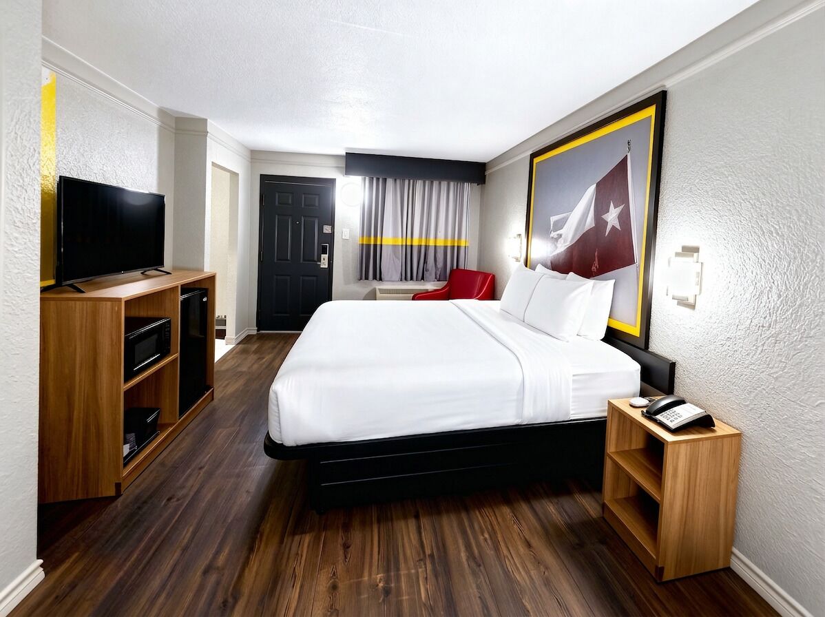 Down duvets, desk, laptop workspace, blackout curtains