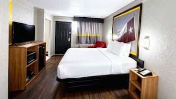 Down duvets, desk, laptop workspace, blackout curtains