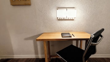 Down comforters, desk, laptop workspace, blackout drapes