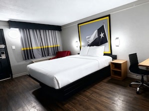 Down duvets, desk, laptop workspace, blackout curtains