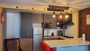Estudio Deluxe, vista al lago | Cocina privada