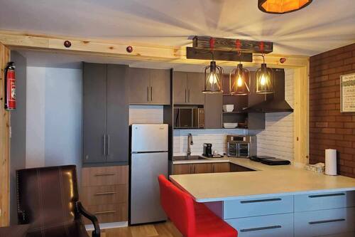 Studio Deluxe, vue lac | Cuisine privée | Grille-pain, îlots de cuisine