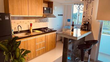 Comfort Apartment, Balcony, City (B) | Private kitchen | Fridge, microwave, stovetop, electric kettle