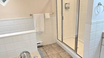 Jetted bath, hair dryer, towels, soap