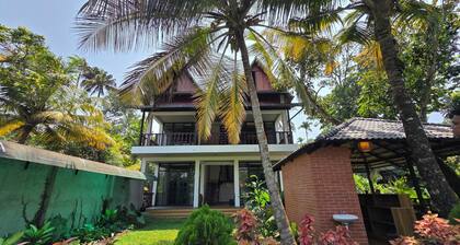 Mango Lantern Villa By Mirth Kollam