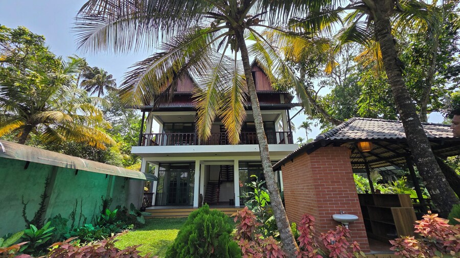 Mango Lantern Villa By Mirth Kollam
