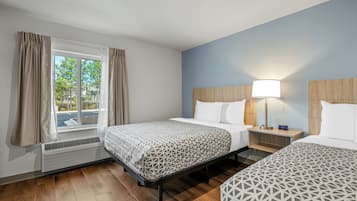 Desk, laptop workspace, free WiFi, bed sheets