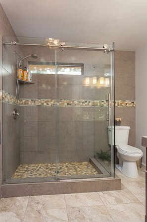 Shower, hair dryer, towels, soap