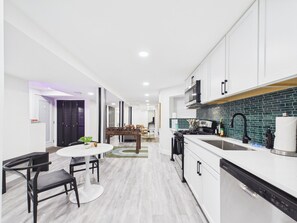 Fridge, microwave, oven, stovetop - Elite 2BR Art Deco retreat. Steps to Wrigley. (Chicago)