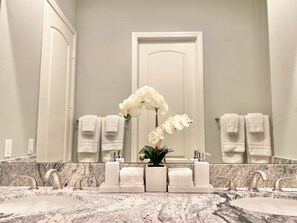 Hair dryer, towels, soap, shampoo