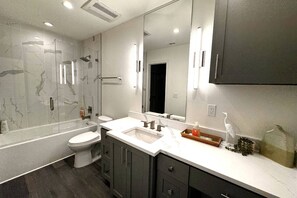Hair dryer, towels, soap, shampoo