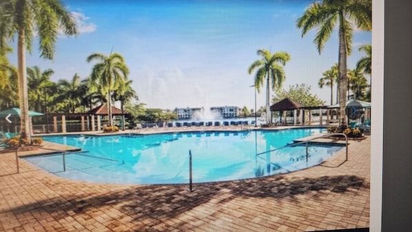 Pool - 2-bedroom condo across the street and access to trump resort (Miami)