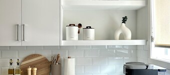 Modern South Calgary Retreat – Sleeps 6 + Private Garage!