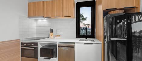 Fridge, microwave, dishwasher, cookware/dishes/utensils