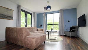 Living room - Bright Bungalow in Peaceful Park Setting (Ewijk)