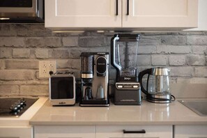 Fridge, microwave, coffee/tea maker, toaster