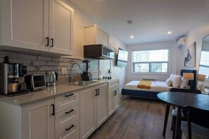 Fridge, microwave, coffee/tea maker, toaster