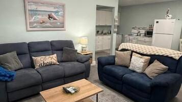 Deluxe tweepersoonskamer, uitzicht op tuin | Woonruimte