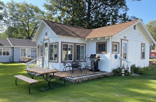 3 Cozy Cabins Nestled on Houghton Lake w/Waterfront Decks
