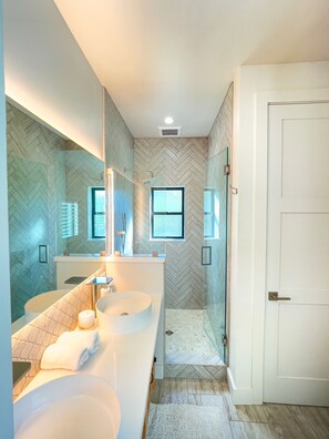 Shower, hair dryer, towels, soap