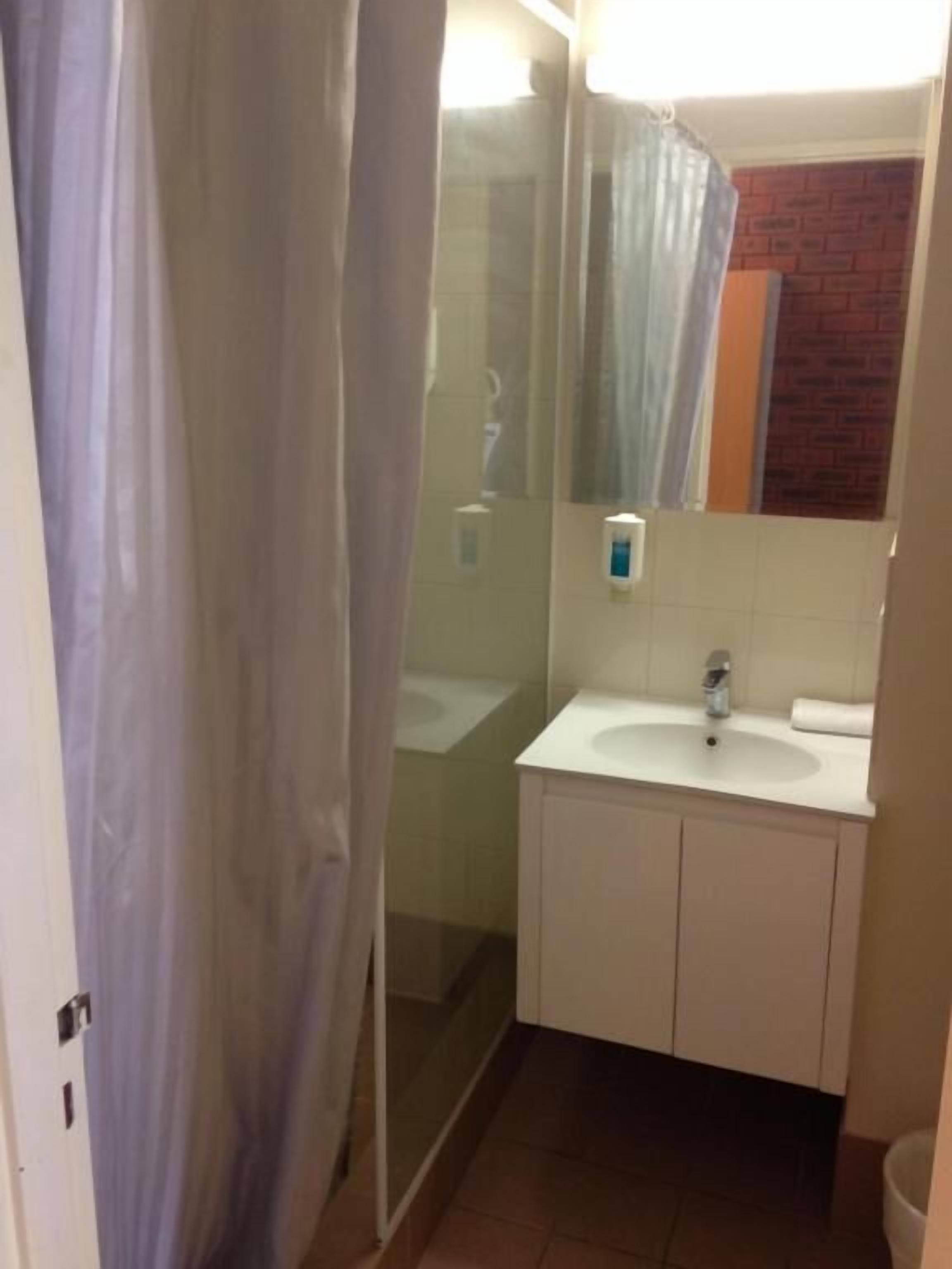 Shower, free toiletries, towels, soap