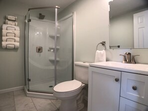 Shower, hair dryer, towels, soap