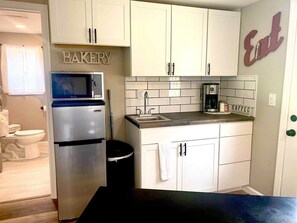 Fridge, microwave, dishwasher, coffee/tea maker