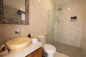 Shower, towels, soap, shampoo