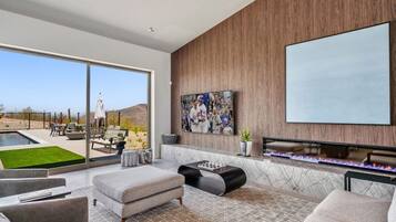 Smart TV, fireplace, books, offices