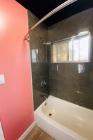 Standard Single Room | Bathroom | Bathtub, towels, soap, shampoo