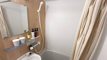 Hair dryer, towels, soap, shampoo