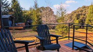 Cabaña Confort, patio, vista al jardín | Terraza o patio