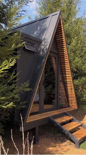 Classic Cabin, Patio, Garden View | Premium bedding, minibar, individually decorated, individually furnished