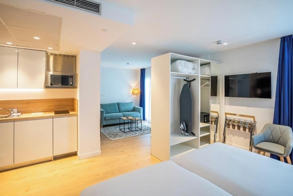 Imagine easy mornings with kitchenette convenience and cozy lounge.