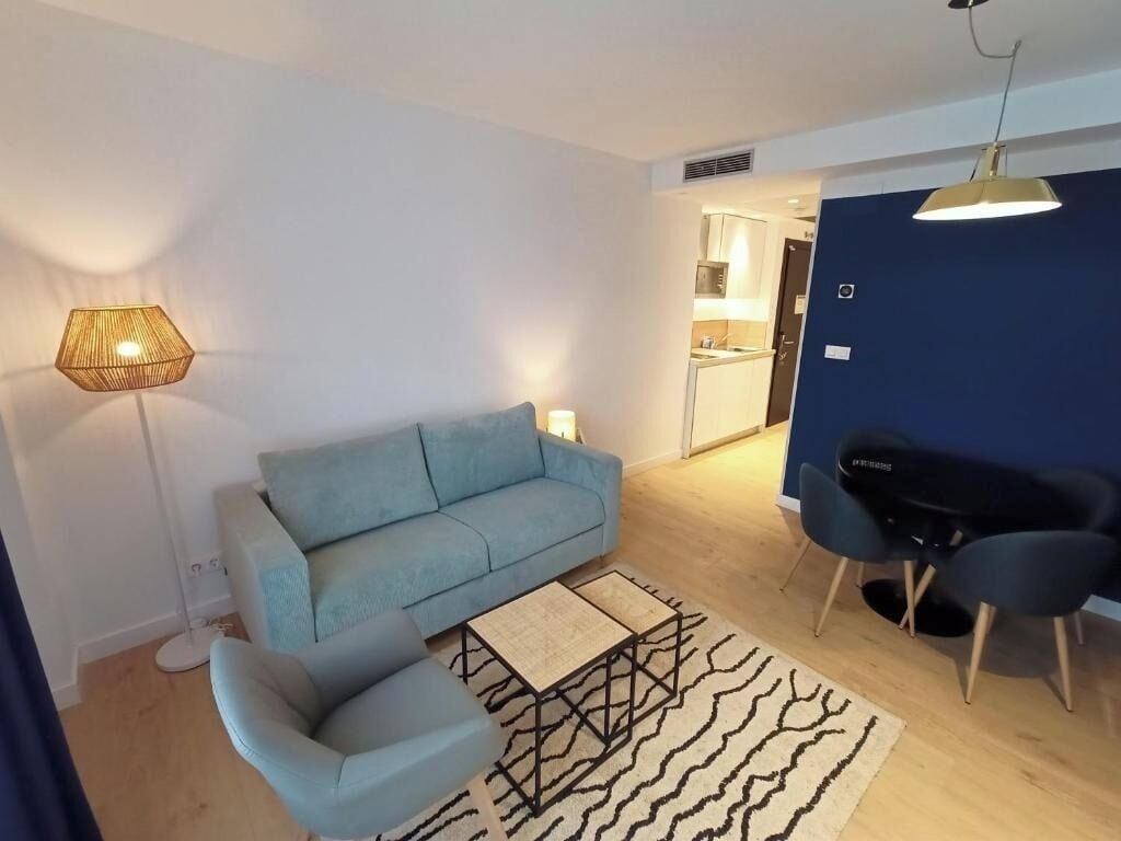 Lounge after exploring in a cozy, softly lit living area.