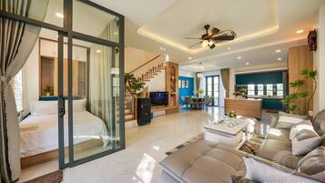 Luxury Villa, Garden View | Living area | 55-inch Smart TV with satellite channels