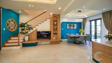 Luxury Villa, Garden View | Living area | 55-inch Smart TV with satellite channels