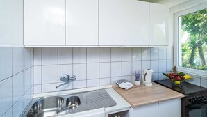 Luokittelematon kuva, 5 kautta 45, painike