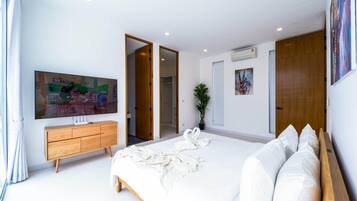 Villa, Pool View | In-room safe, laptop workspace, blackout drapes, iron/ironing board