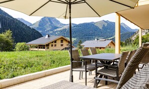Apartamento | Restaurante al aire libre