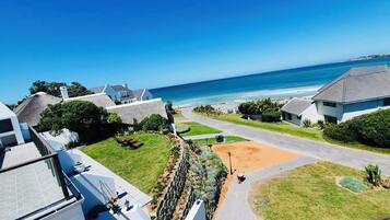 On the beach, white sand, beach towels