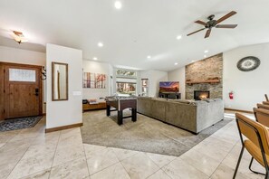 Smart TV, fireplace, DVD player, foosball