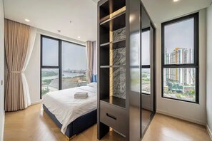 Family Suite, 3 Bedrooms, Club lounge access, City View | Egyptian cotton sheets, premium bedding, down duvets