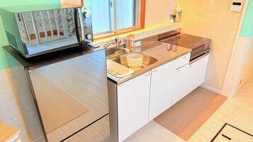 Fridge, microwave, stovetop, cookware/dishes/utensils